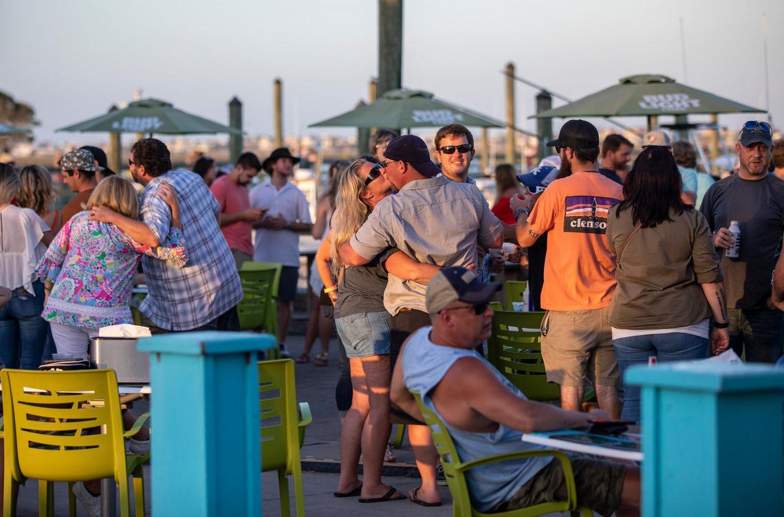 Diners gather around local restaurants at the Murrells Inlet Marsh Walk. With hotels, beaches, shopping and restaurants reopening along the Grand Strand, tourist season kicked off this weekend despite coronavirus concerns. May 16, 2020