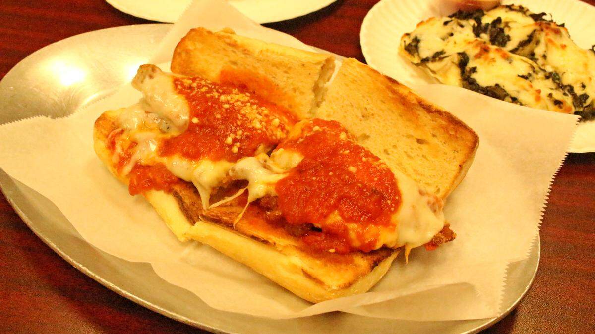 Gino’s chicken parmesan sub and pinwheels.