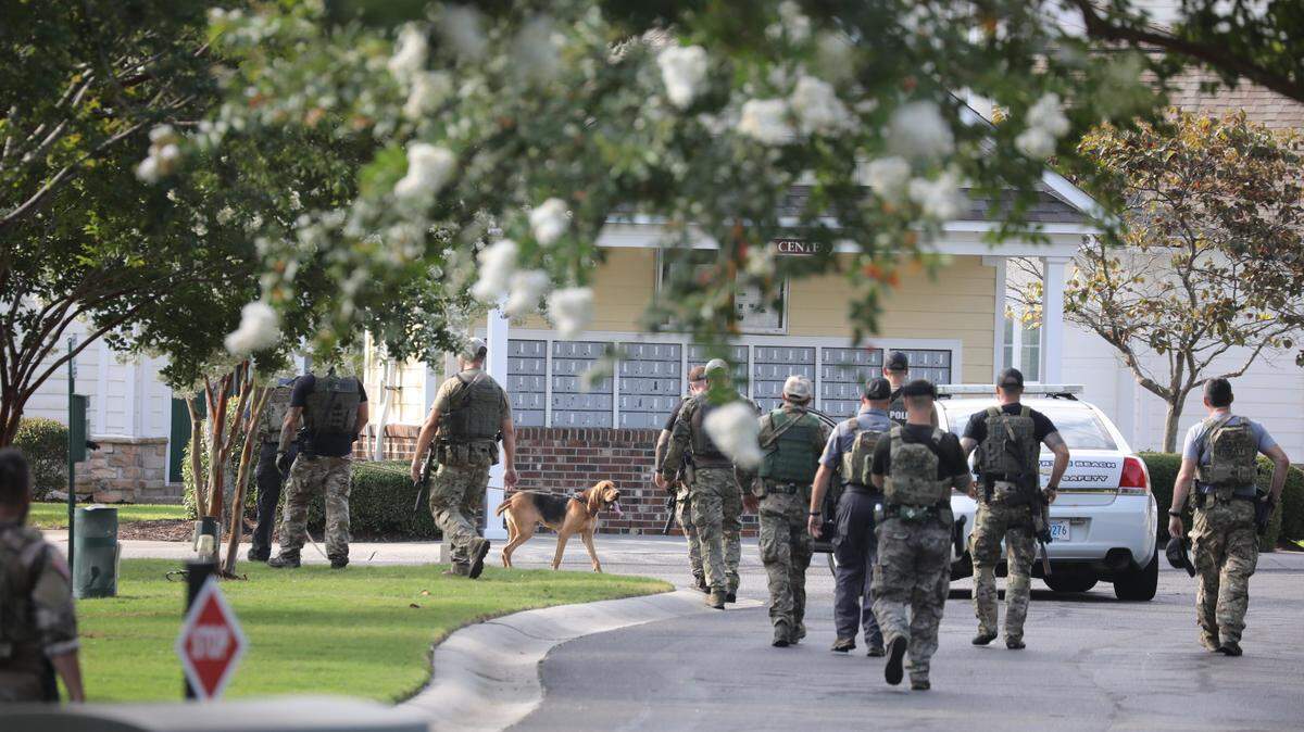 Law enforcement are searching the Tanglewood area of Barefoot Landing Resort Thursday July 21 in North Myrtle Beach, where they believe an armed and dangerous suspect in a police-involved shooting could be hiding.