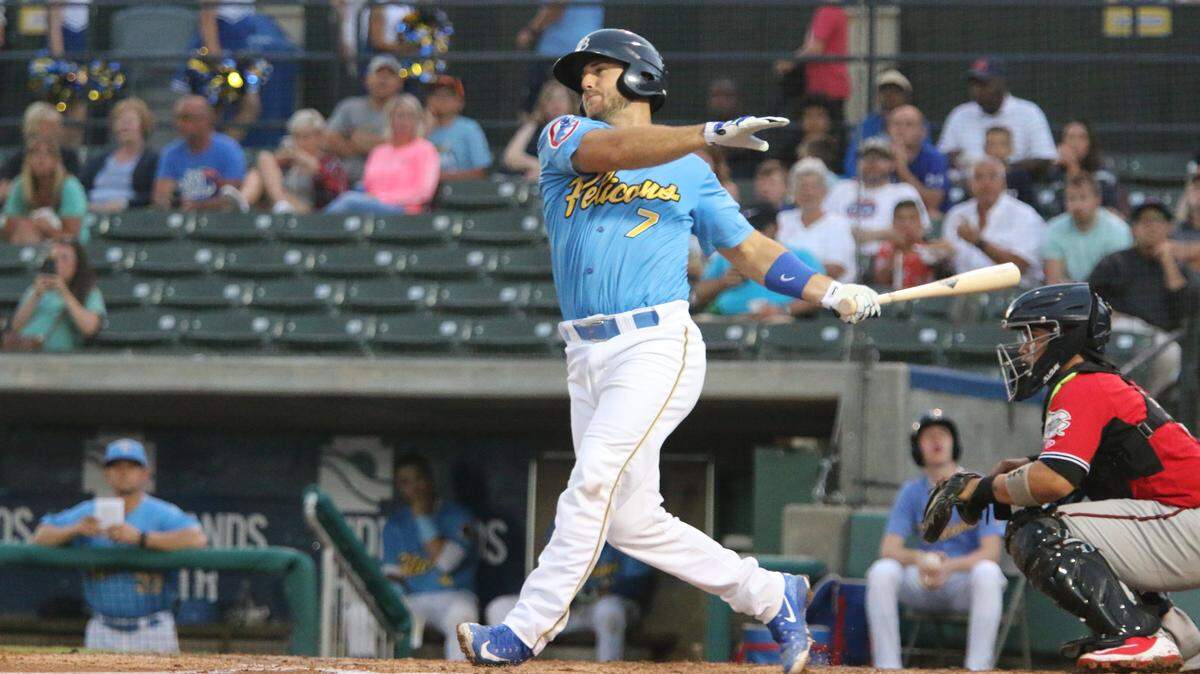 Myrtle Beach Pelicans catcher Tyler Pearson takes a swing during an at-bat.