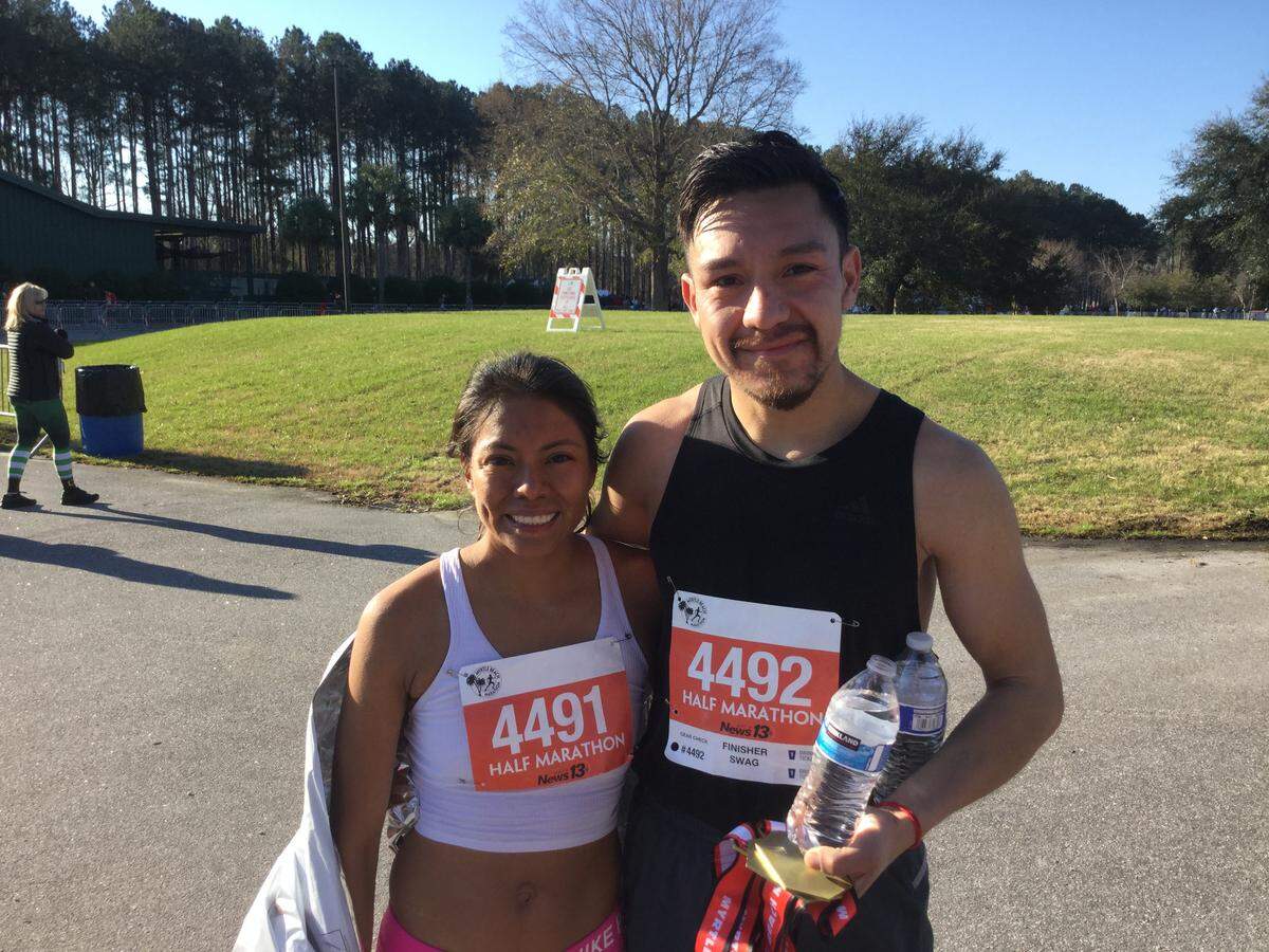Ivette Mejia (left) of Manhattan won the women’s Myrtle Beach half marathon on Saturday in a time of 1:13:53. Her boyfriend, Miguel Galvez of Passaic, N.J., ran alongside and helped her push the pace.