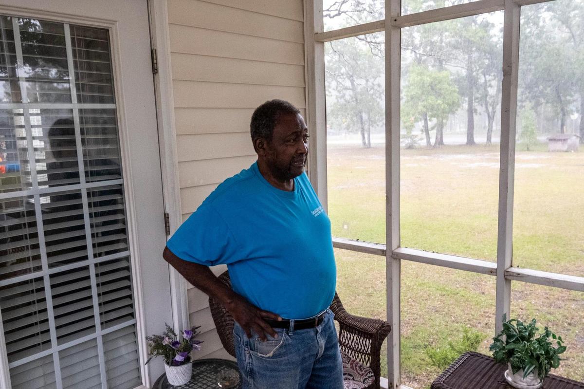 James B. Bryant looks out over his property across the street from the proposed rezoning that would allow mobile homes to be added nearby. Bryant opposed Lenoris Willard’s request to rezone a parcel of land at the corner of Willard Road, Dewitt Road and Sugarbowl Lane in the Poplar community which would add four mobile homes. Bryant fears the project could damage the value of his own property. June 4, 2021.