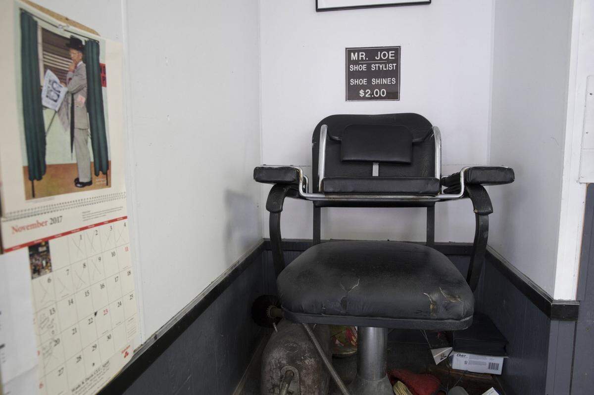 Joe White’s shoe shine chair remains in Woody’s Barber shop along with pictures and other memorabilia to the Myrtle Beach local. Mr. Joe White Boulevard is named for Joe White, a long term resident of Myrtle Beach who worked as a “shoe stylist” and rode his bike up 10th Avenue to work at Woody’s Barber Shop. Friday, Nov. 11, 2017.