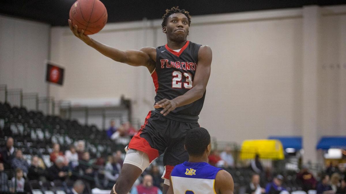 Florence (MS) senior forward Jaylen Forbes lays the ball up against North Little Rock (AR) in the 2018 Beach Ball Classic Wednesday at the Myrtle Beach Convention Center.