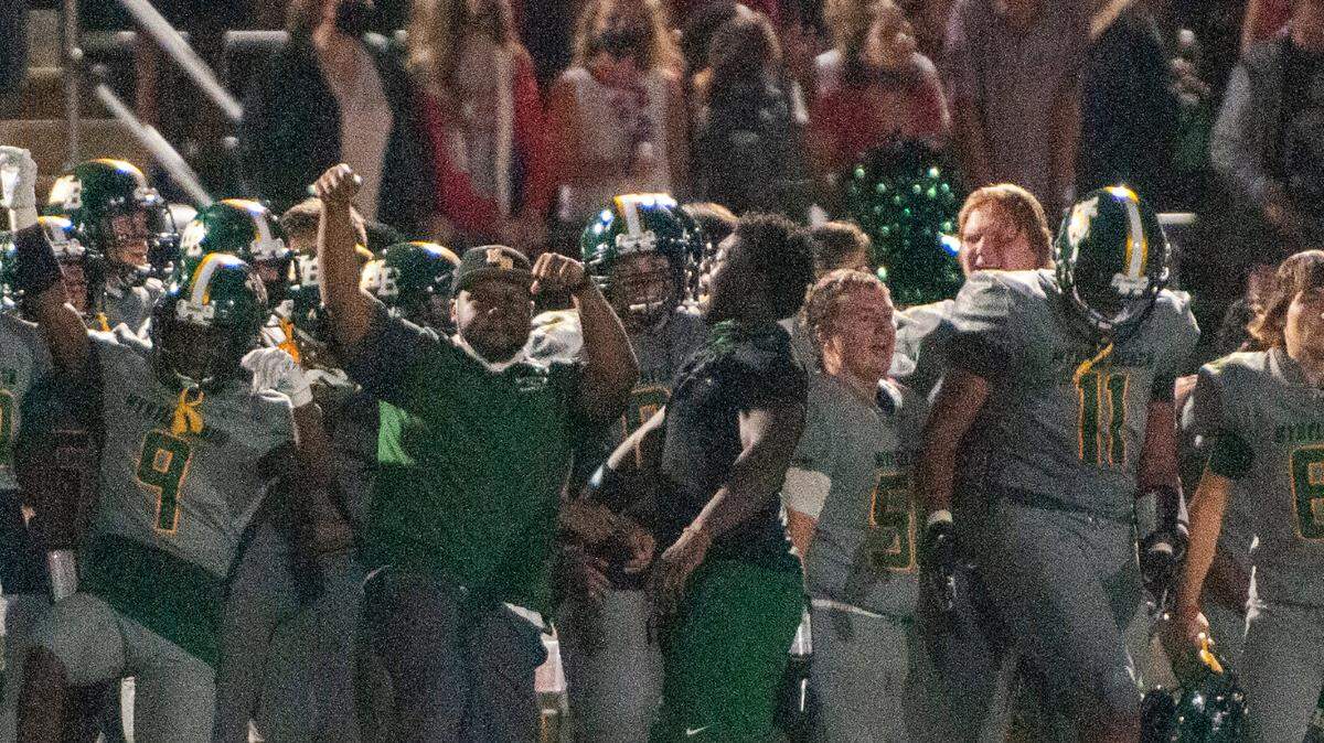 Adam Randall pulls in a catch during the Darlington at Myrtle Beach high school football season opener.