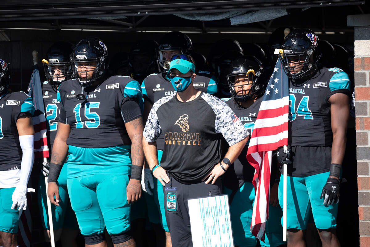 Coastal Carolina head coach Jamey Chadwell prepares to lead his team onto the field against Appalachian State on Nov. 21, 2020 at Brooks Stadium in Conway. CCU won to take over first place in the Sun Belt Conference’s East Division.