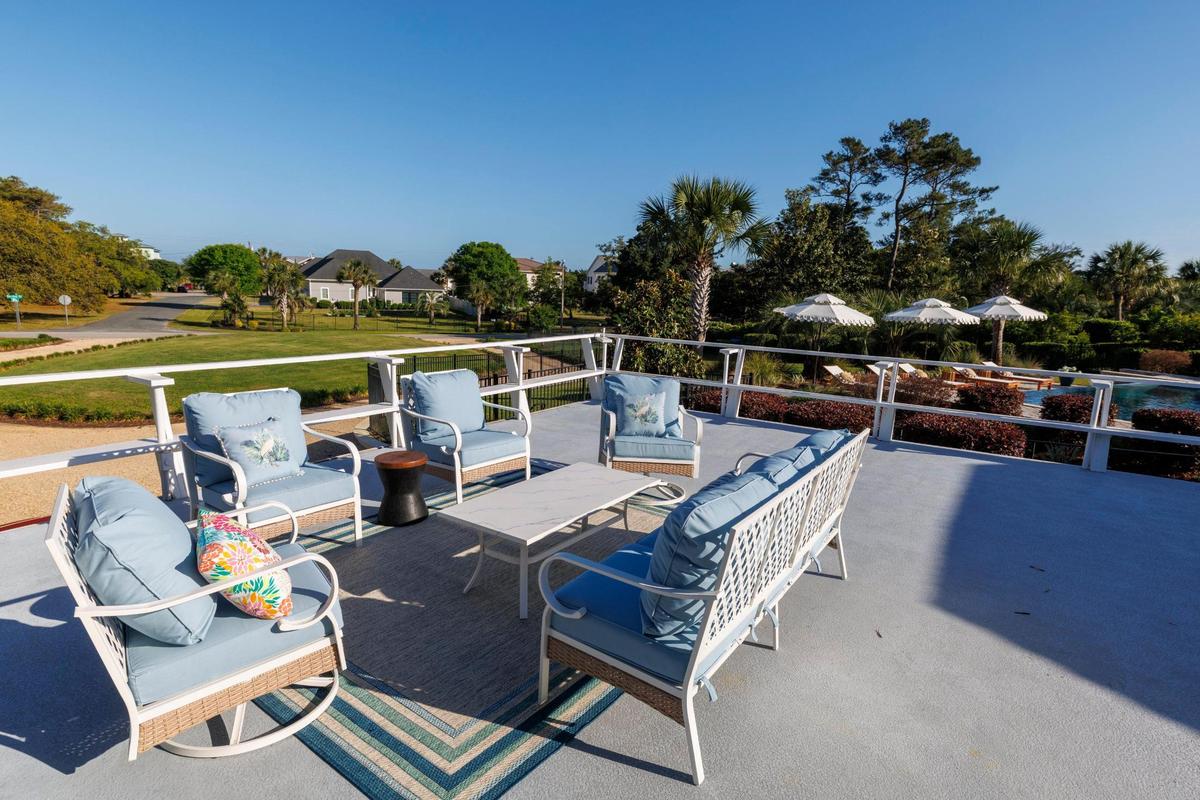 The “Shag House” on Burchap Drive in Myrtle Beach was featured in the 1989 film “Shag: The Movie.” Current owner Maggie Maher has spent 10 years renovating the home but has left touches, like the expansive front porch, as homage to the home’s history. May 1, 2025.
