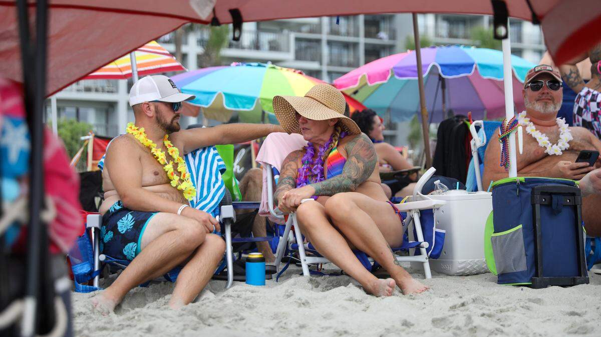 Dozens of OutMyrtleBeach members, an organization of LGBTQ+ members from across the Grand Strand gathered at 72nd Avenue North in Myrtle Beach for their final “Big Gay Beach Day” of the season. Aug. 3, 2025.