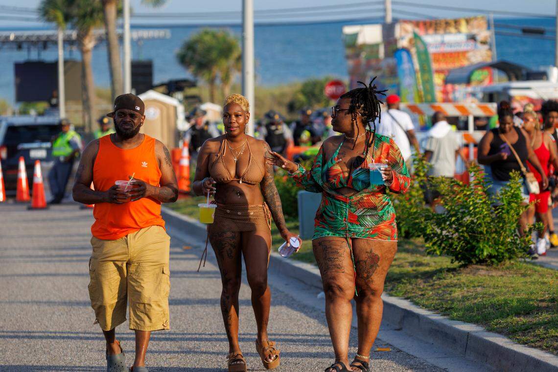 Visitors attend the Atlantic Beach Black Pearl Cultural Heritage and Bike Festival in Atlantic Beach and socializing with fellow riders. May 23, 2025.