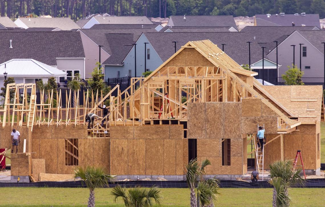 Contractors work on a new home in Waterside Pointe, a Grande Dunes neighborhood in Myrtle Beach. New development continues along the Intracoastal Waterway in the Myrtle Beach area. May 5, 2020