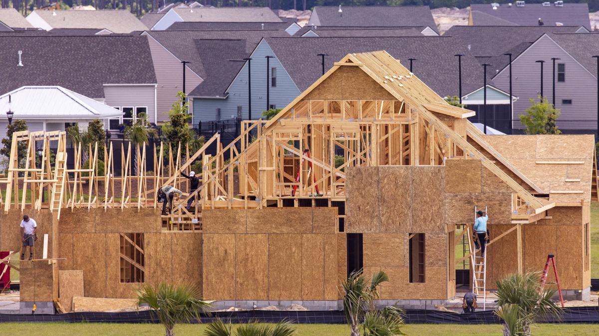 Contractors work on a new home in Waterside Pointe, a Grande Dunes neighborhood in Myrtle Beach. New development continues along the Intracoastal Waterway in the Myrtle Beach area. May 5, 2020
