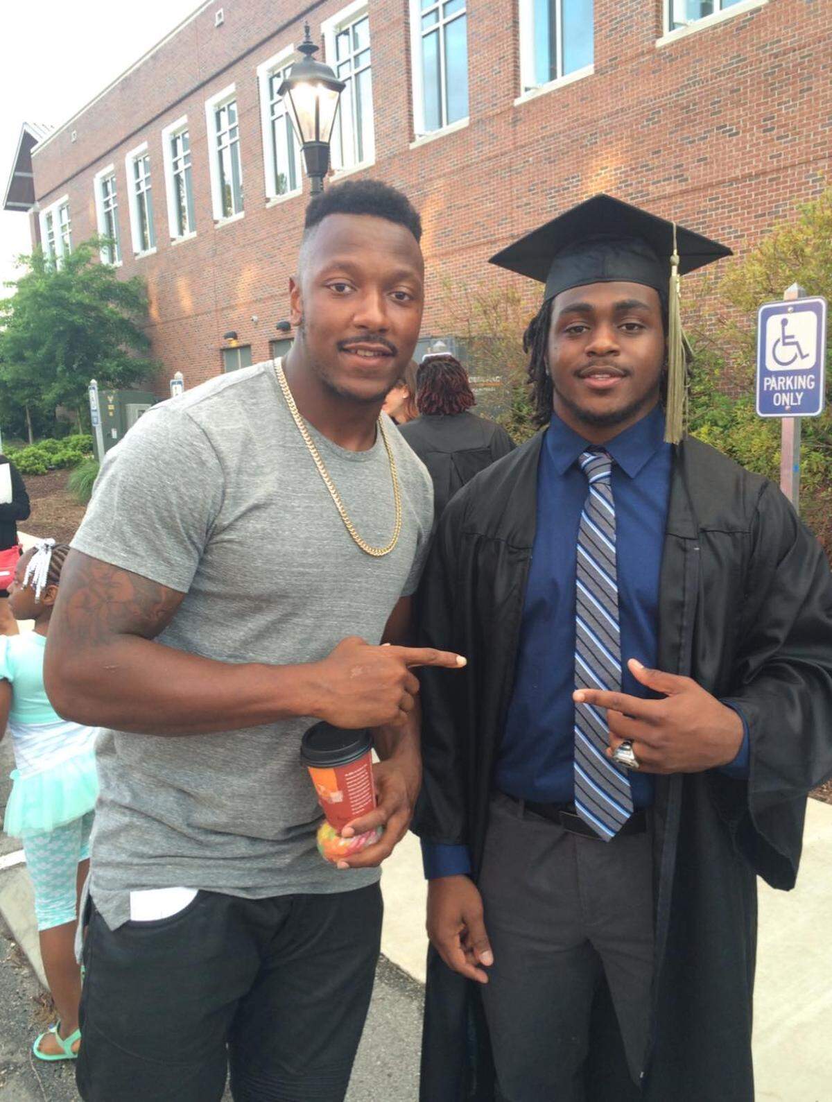 Lorenzo Taliaferro and De’Angelo Henderson after Henderson’s graduation from Coastal Carolina.