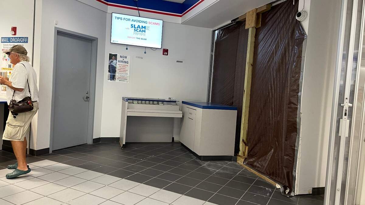 Plastic covers the windows inside the lobby of the 67th Avenue post office in Myrtle Beach. A vehicle crashed through the window and into the front lobby while customers and employees were inside. One person was injured. Oct. 2, 2023
