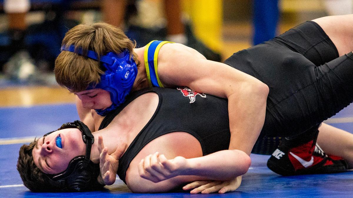 North Myrtle Beach’s Jackson Smith pins Hartsville’s Joshua Askins Wednesday night during the South Carolina Class 4A state high school wrestling semifinals at North Myrtle Beach High School. Hartsville defeated North Myrtle Beach.