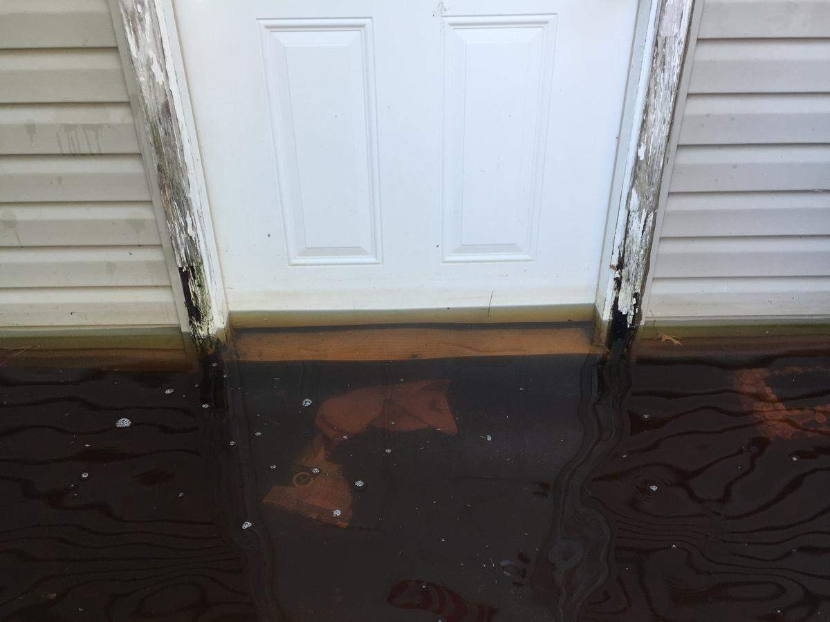 A look at the water level outside of Jay and Cessa Davis’s home on Sept. 23, 2018.