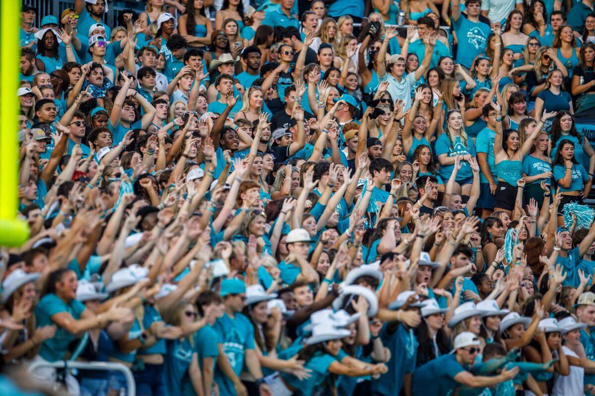 Coastal Carolina University’s student section cheers as CCU faced off against William & Mary on Saturday evening. Sept. 7, 2024. The game featured several new components for fan experience.