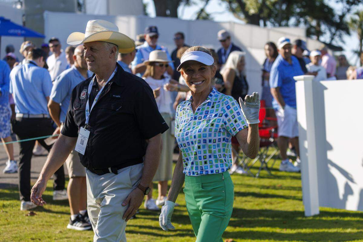 Vanna White waves to fans before teeing off at the Dunes Golf and Beach Club. The ONEflight Myrtle Beach Classic Celebrity Pro-Am event was held on Wednesday at the Dunes Golf and Beach Club. The PGA tournament is being held through the weekend in Myrtle Beach, SC. May 6,2026.