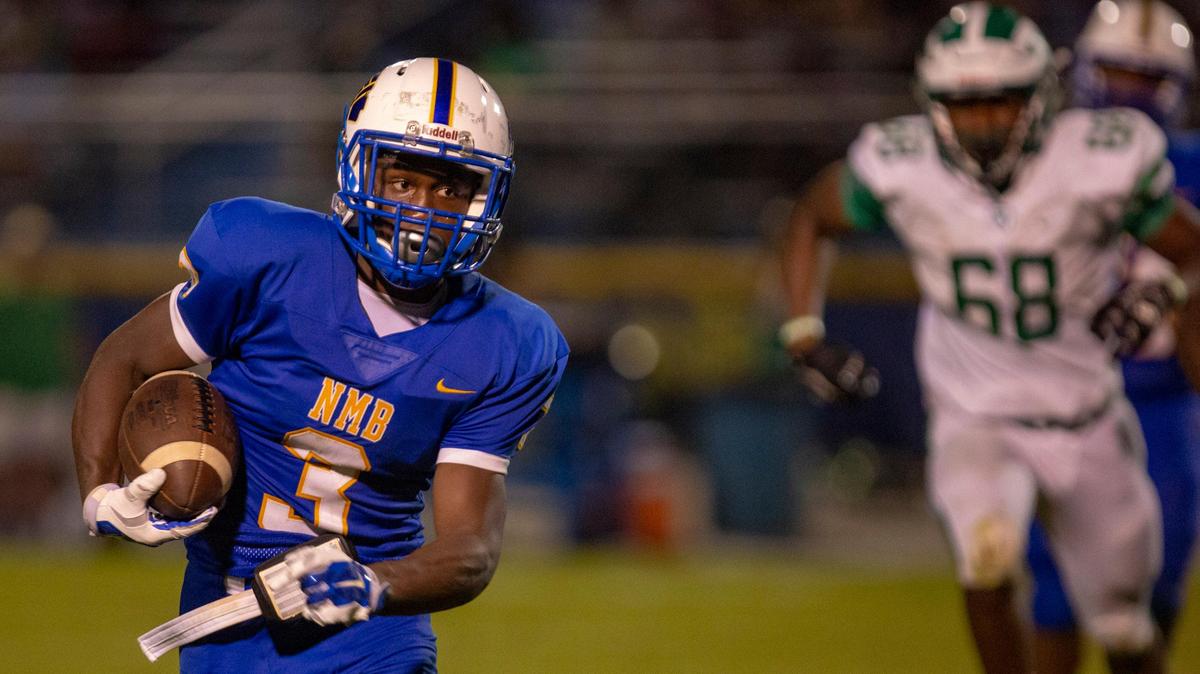 North Myrtle Beach Chiefs running back Ramsey Lewis runs the ball against the West Brunswick Trojans Friday night in Little River. The Chiefs defeated the Trojans 35-10.
