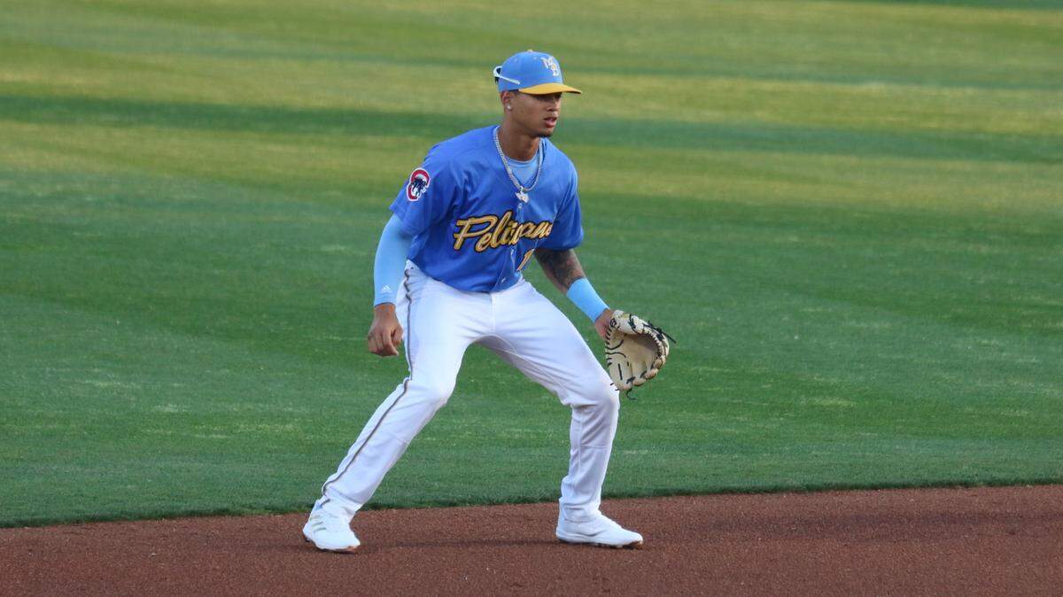 Shortstop fielding a ball.