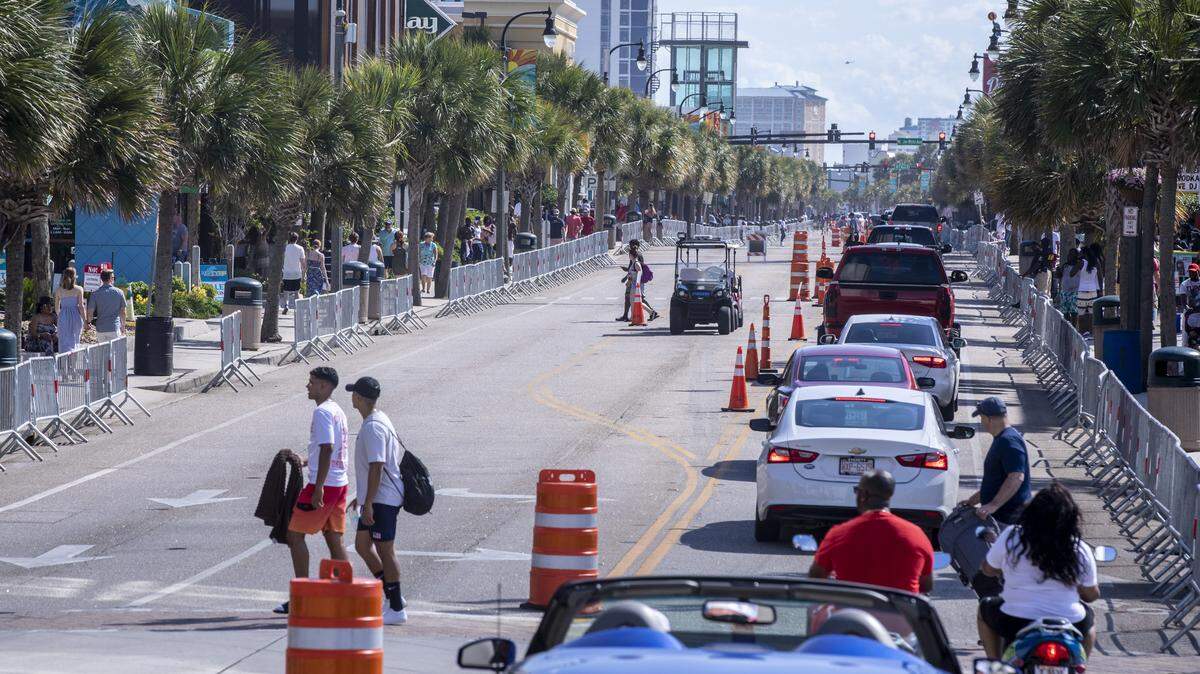 Though barricades were in place, this Saturday of Memorial Day weekend looked much different from years past. With Bike Fest postponed, family groups, some wearing masks walked Ocean Boulevard. May 23, 2020