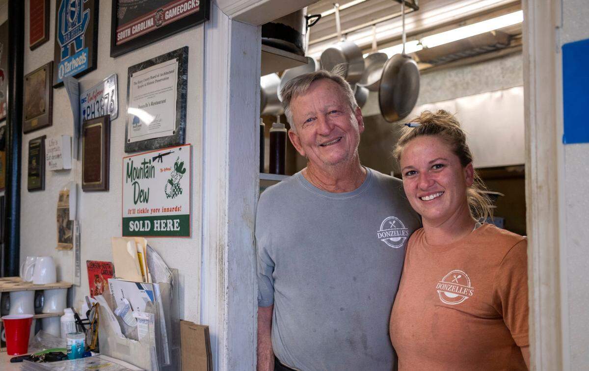 Larry Dickerson with his daughter Marley Crotts, co-owners of Donzelle’s Restaurant in Conway, S.C. January 25, 2023.