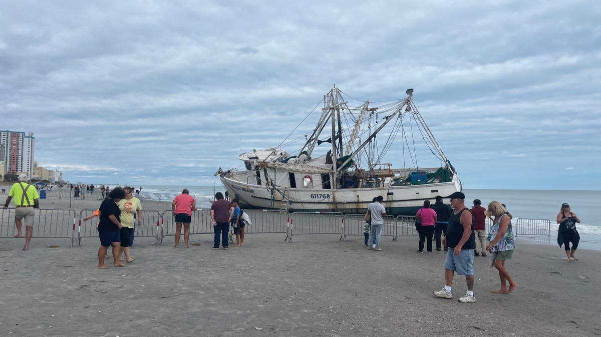 The shrimp trawler Shayna Michelle washed ashore in Myrtle Beach during Hurricane Ian.