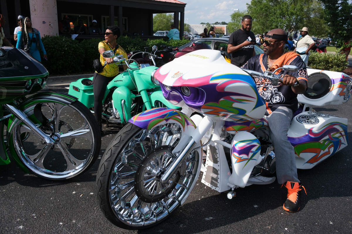 Bikers displayed their custom creations outside of Hooters at the Myrtle Beach Mall on Friday. The 2024 Black Pearl Cultural Heritage and Bike Festival, also known as Black Bike Week, came roaring into the Northern end of the Grand Strand Friday night. Bikers gathered at the Myrtle Beach Mall to show off their rides, cruised through Atlantic Beach, and partied under beach houses in North Myrtle Beach. S.C. May 24, 2024.