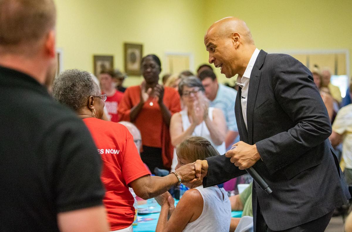 United States Senator and 2020 presidential candidate Cory Booker shakes hands with Horry County residents at the Bucksport Senior Center in Bucksport, S.C.