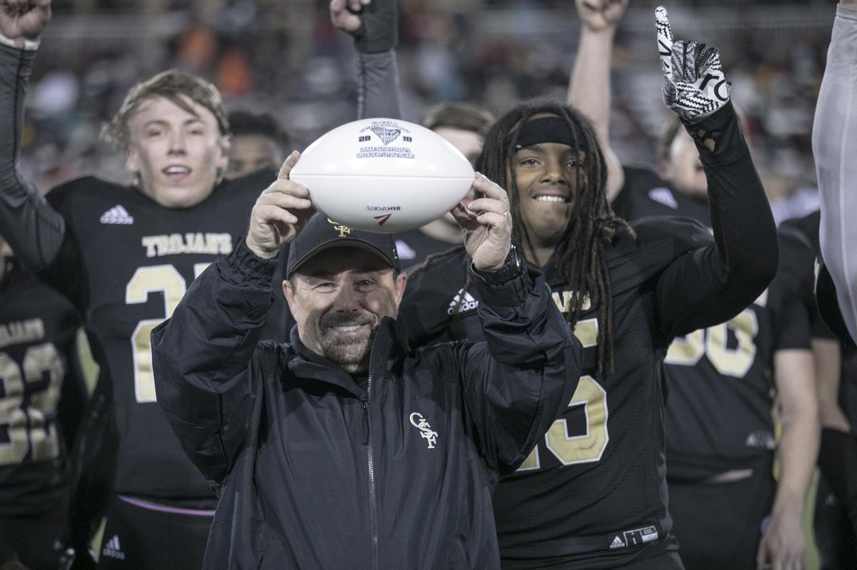 Green Sea Floyds coach Donnie Kiefer holds the championship ball after his class 1A State Championship win with a score of 26-20 (final) at Charles W. Johnson stadium in Columbia, S.C. Dec 07, 2018.