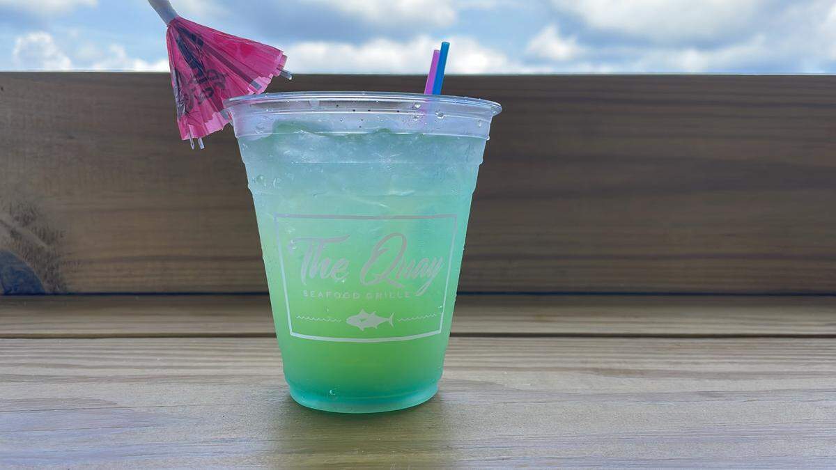 The restaurant’s specialty “Quay Juice” cocktail. The beverage is made with rum, blue curacao, triple sec, pineapple juice and sprite.
