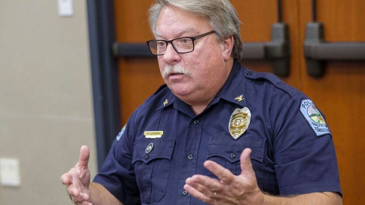 Dena Chasten, a relative of Malquan Hawkins, meets with Pawleys Island Chief of Police Michael Fanning, and Horry County Chief Deputy coroner Tamara Willard to talk about the genealogical research that resulted in identifying Horry County's longest standing cold case involving the deceased. Malquan Tyreek Hawkins, 22 at the time of his death, was found drowned in a resort pool in 2016 leaving no clue of his identity. The Horry County coroners have been searching for answers to his life and identity since. Nov. 12, 2025.