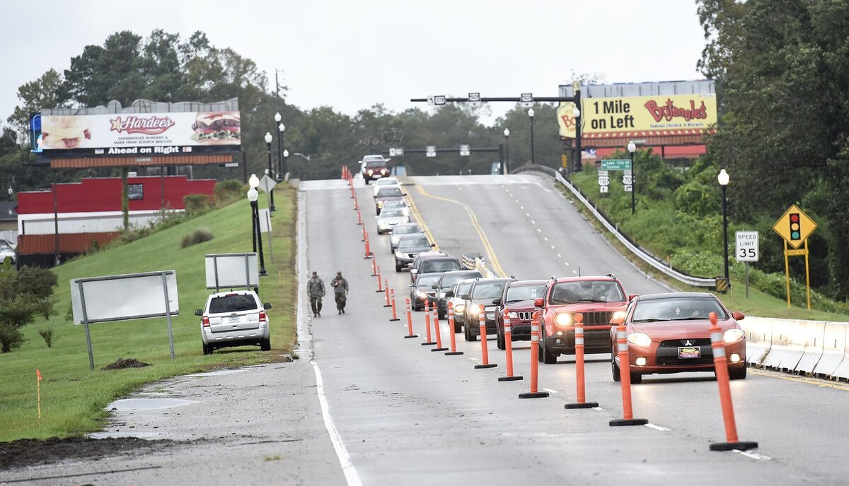 The US National Guard and SCDOT worked together to create a flood barrier along US 501 in Conway. Traffic was restricted to only one lane heading south.