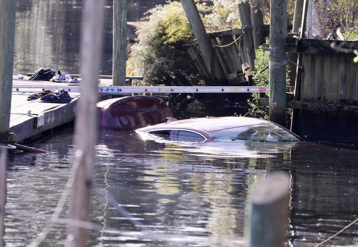 Crews are working to remove a vehicle submerged underwater near Anchor Marina in North Myrtle Beach following an overnight crash.