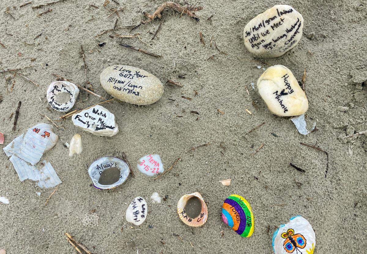 All that is left at the ‘Angel of Hope’ site are shells left by visitors painted with the remembrances of loved ones. Aug. 22, 2022.