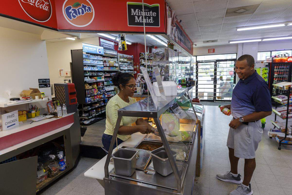 The 4-Way Fuel Sunoco gas station in Conway is now offering Indian cuisine. Laxmi and Lovey Vaid have been operating the station for ten years but Lovey Vaid, a trained chef, has recently started cooking for the station. The menu includes tandoori chicken wraps, butter chicken and samosas topped with chickpea chaat masala. His specialty offerings has is garnering attention on social media. Aug. 8, 2025.