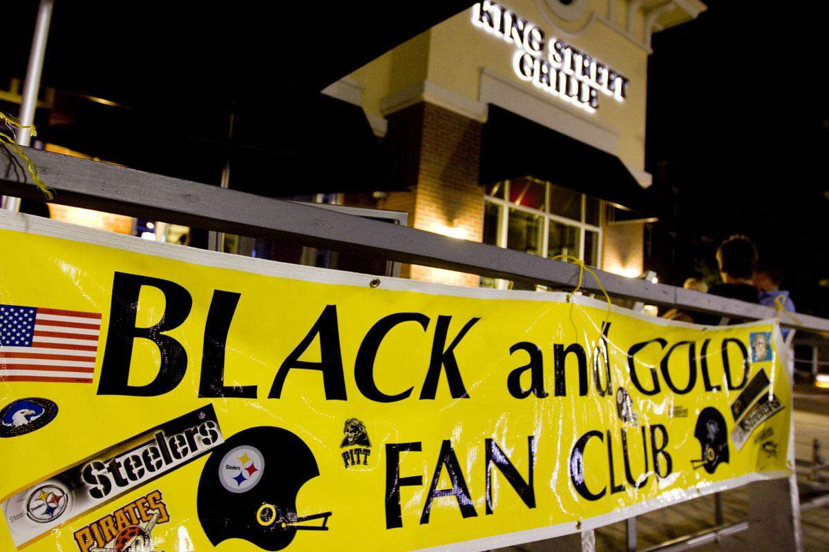 The King Street Grille in Market Common is adorned with a Pittsburgh Steelers banner in this Sun News file photo.