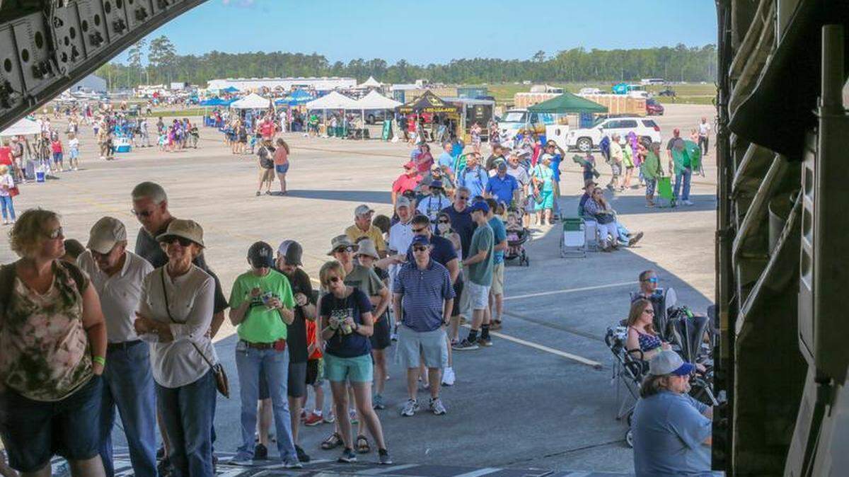 Air show attendees tour a C-17 military cargo plane at the 2018 Wings Over Myrtle Beach Air Show at the Myrtle Beach Airfield on April 28, 2018.