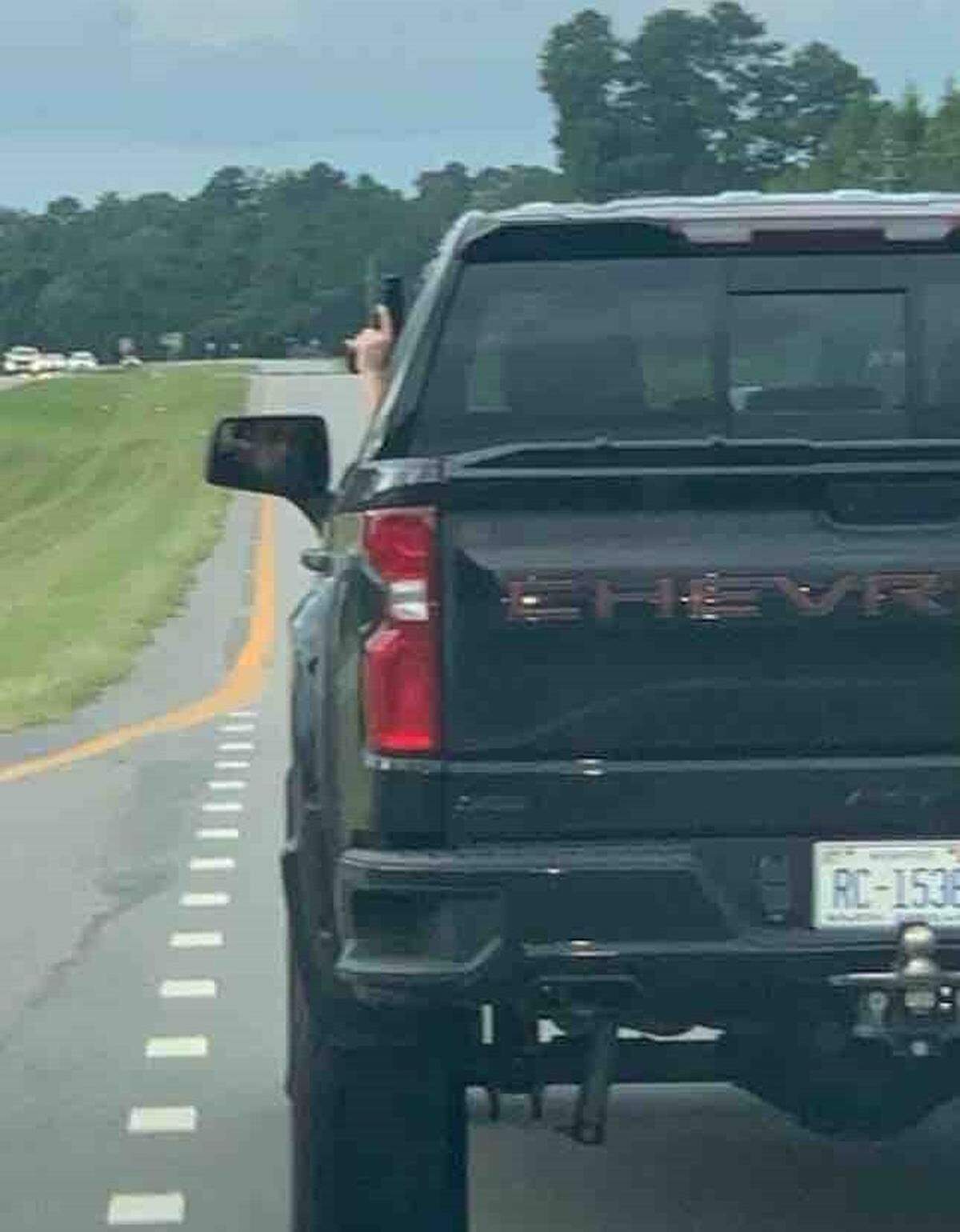 A photo that is believed to have been taken by Weldon Boyd shows Scott Spivey holding a gun outside his truck window along Highway 9 in the Longs area on Sept. 9, 2023. Boyd and his friend, Kenneth “Bradley” Williams later got into a gun battle with Spivey, who died at the scene.