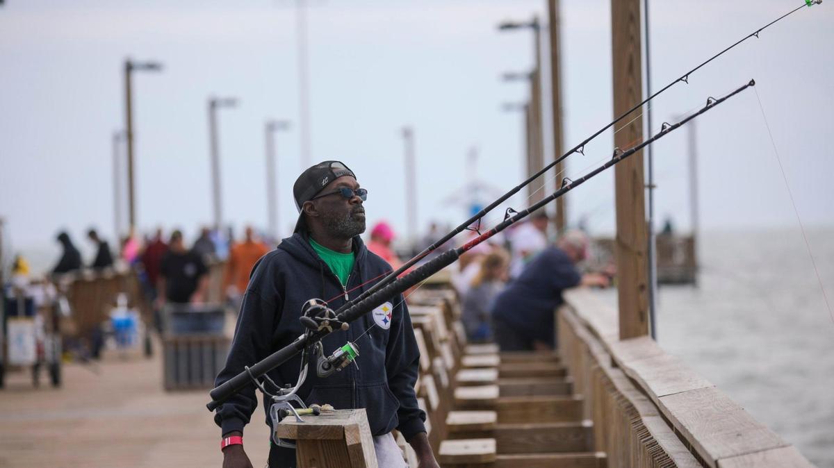 Marese Anthony Odom fishes from the Springmaid Pier in Myrtle Beach. October 10, 2022.