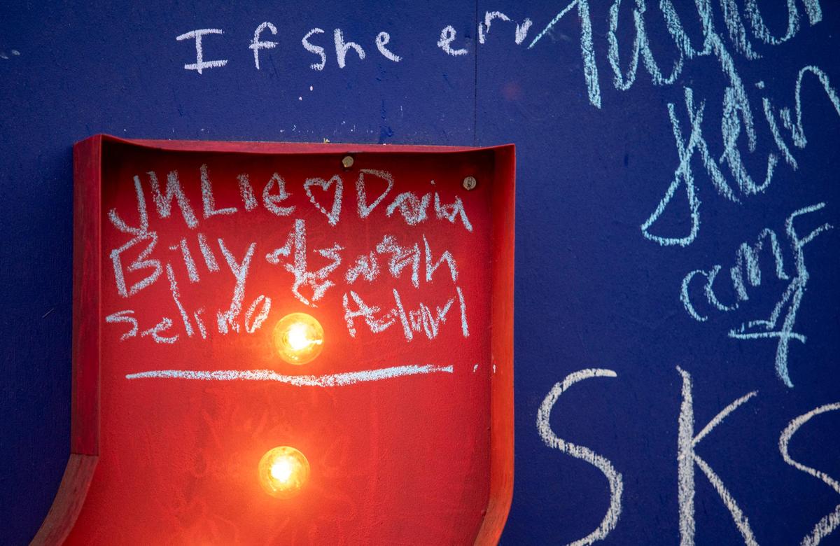 The CCMF wall space where David Allen and Julie Hatfield of of Charleston, S.C., signed their names. Allen proposed to Hatfield moments after both signed.