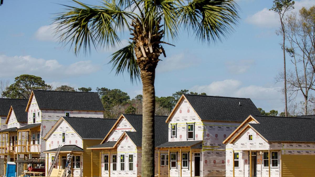Two Myrtle Beach real estate agencies have sued a third, alleging the latter stole clients, data and profits from them. Above, homes to be sold are being constructed near Garden City Beach. March 07, 2022.