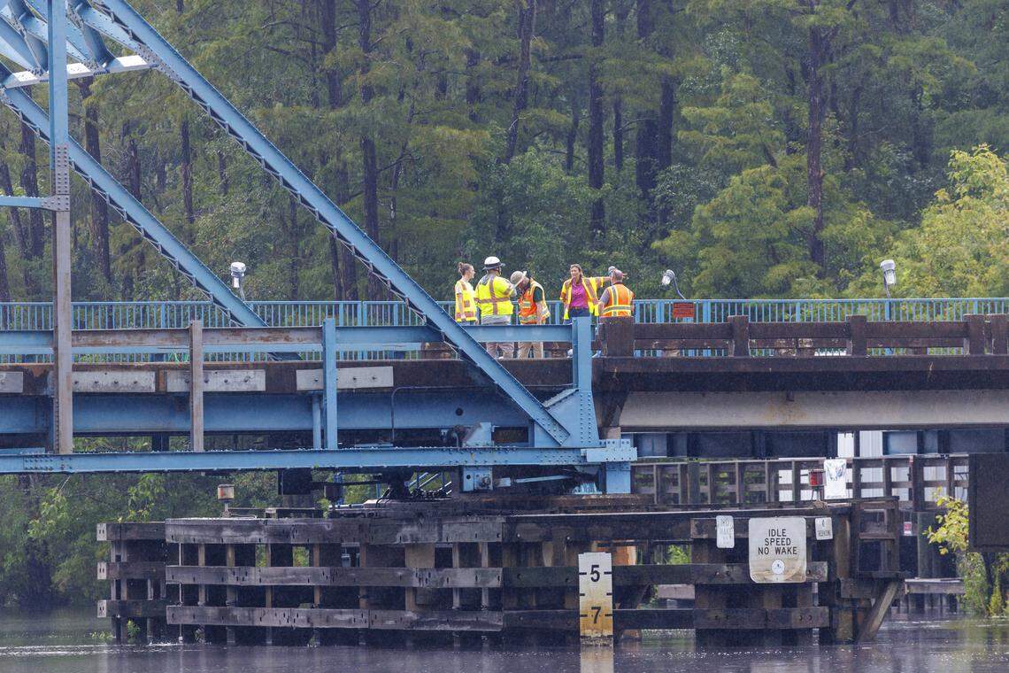 Despite rain storms, crowds gather on the waterfront walkways of Swing Bridge Park in Socastee hoping to catch a glimpse of actors in the Netflix TV show “Outer Banks.” Earlier on Tuesday, Madelyn Cline (Sarah) and Chase Stokes (John B.) could be seen running across the bridge during filming. July 27, 2025.