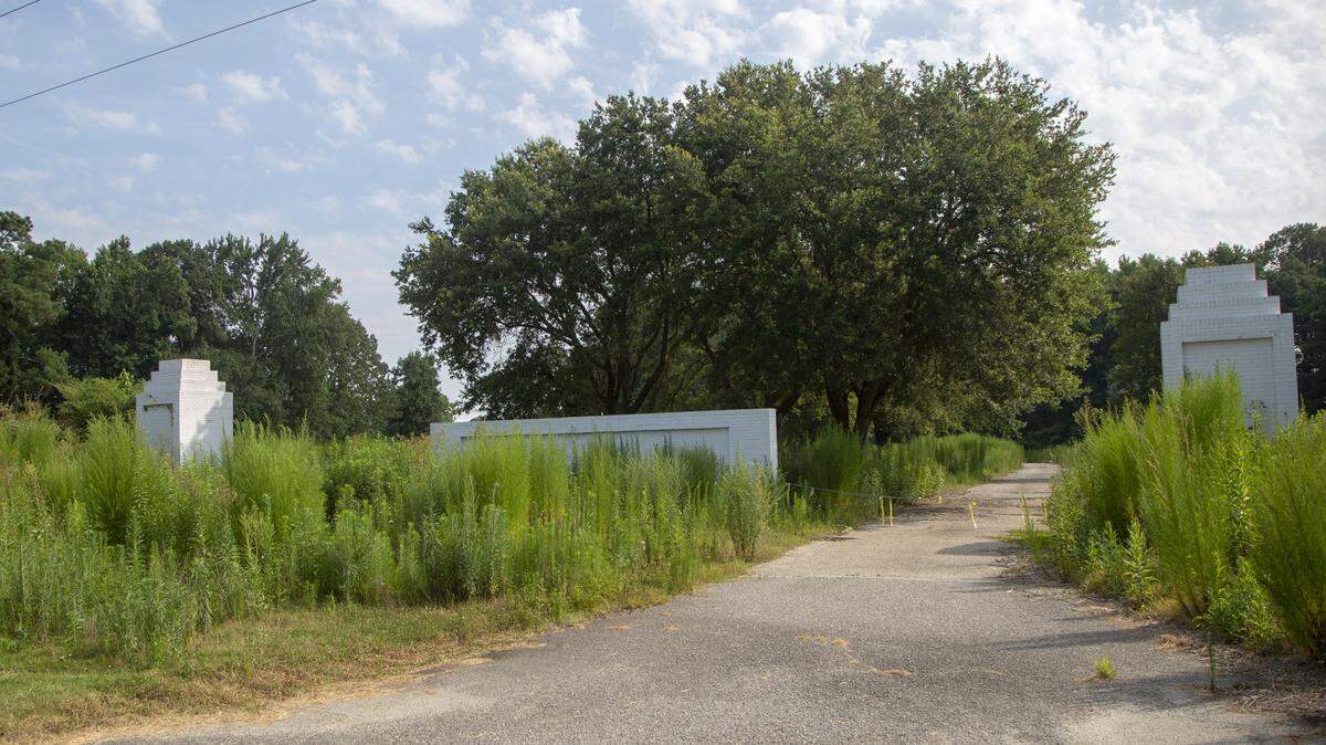 The entrance sign to Black Bear Golf Club in Longs is being overtaken by weeds on July 11.