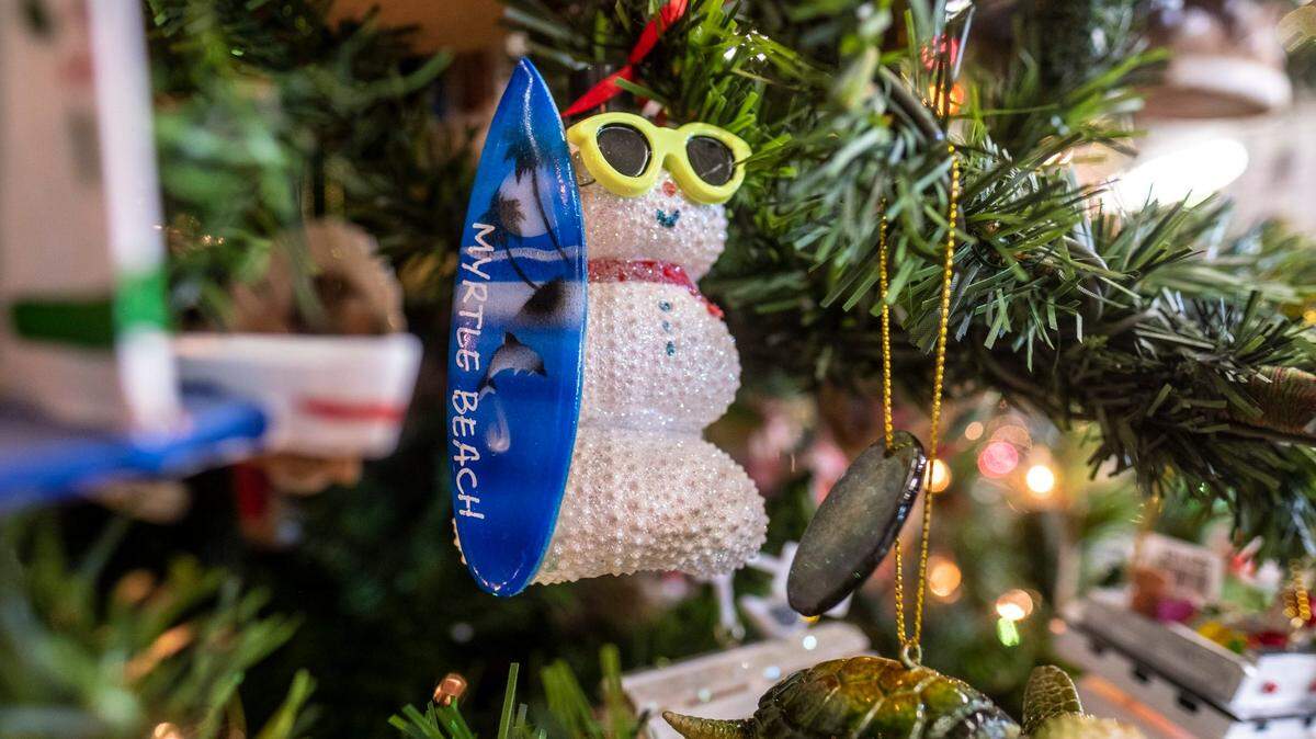 Unique holiday ornaments and decorations fill the Christmas trees and the wall displays of The Christmas Mouse in Myrtle Beach, S.C. November 17, 2022.