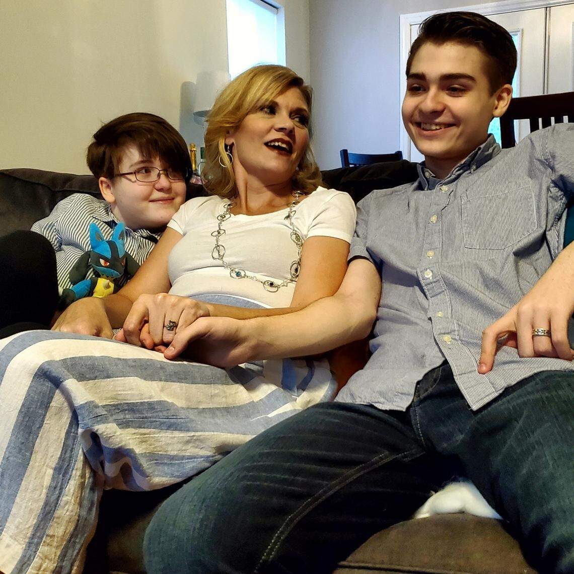 Jennifer Altman (center) pictured in October 2020 with her daughter Sadie (left) and son Oliver, both of whom were born while Altman was on methadone treatment. Altman previously suffered from addiction to OxyContin.