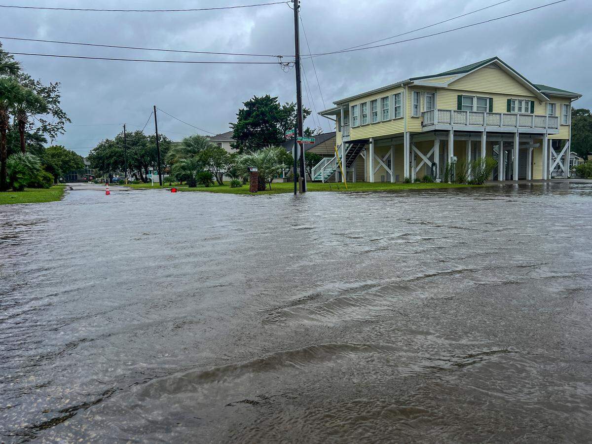 Rains flooded streets in the Cherry Grove section of North Myrtle Beach, S.C. Wednesday afternoon. Tropical Storm Debby continued to impact the Myrtle Beach area on Wednesday with bands of wind and flooding rain moving across the area. Aug. 7, 2024.