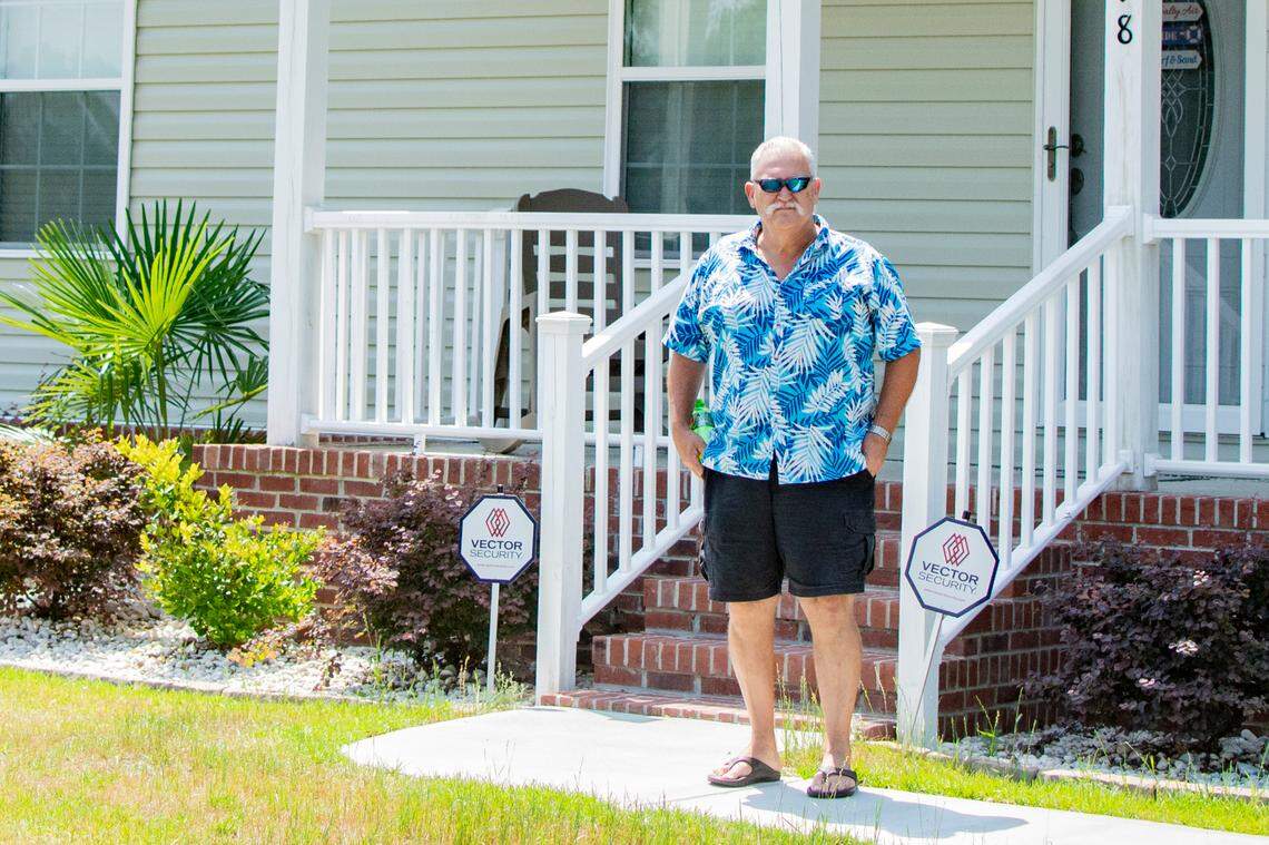 Todd Huffstetler stands in front of his home in the Red Bluff community. Huffstetler was a rare supporter of a large amphitheater project across Highway 905 from his house. He’s said he wants to see the community attract more businesses, grocery stores and restaurants instead of just more residents.