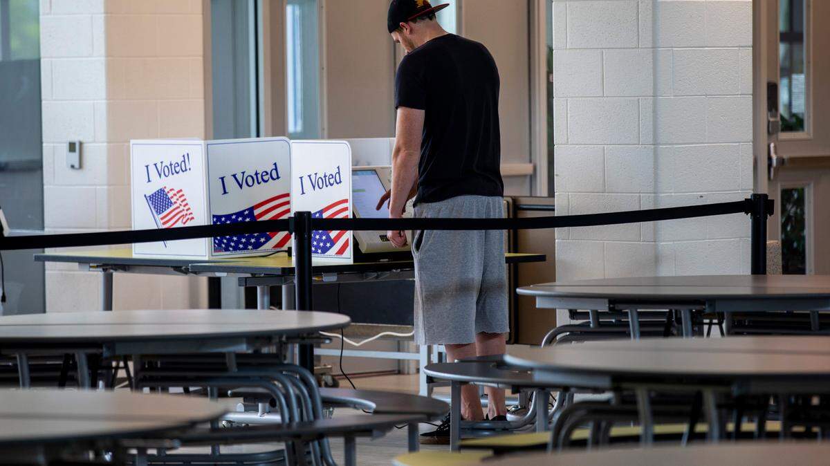 A resident votes in the Myrtle Beach Middle School cafeteria. Horry County residents went to the polls today to vote in several hotly contested primary races including for a U.S. House seat. June 14, 2022.