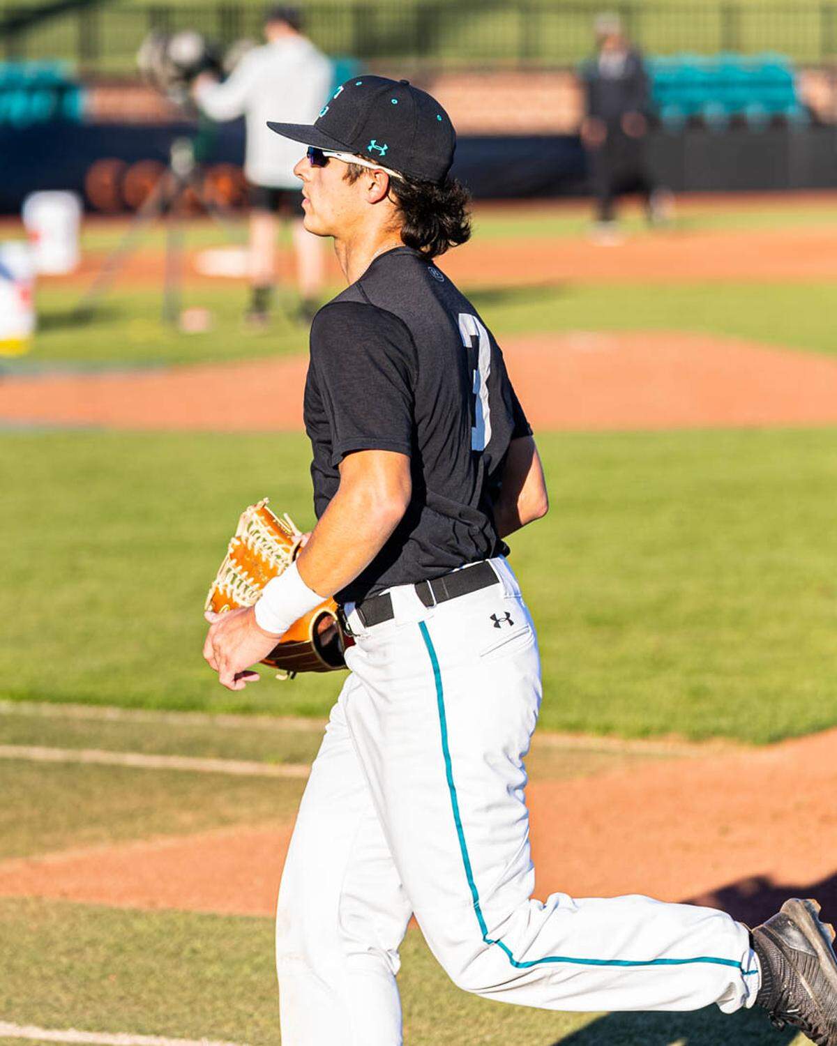 Coastal Carolina outfielder Parker Chavers takes part in an intrasquad scrimmage during preseason practices in February 2021.