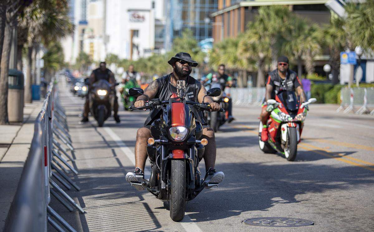 Bikers roll down Ocean Bouleavrd Friday afternoon on the first day of BikeFest in Myrtle Beach.
